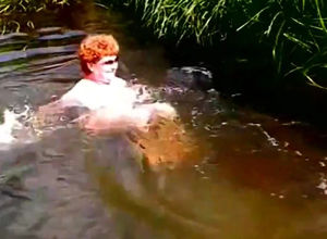 French grandmother nudist swimming in..